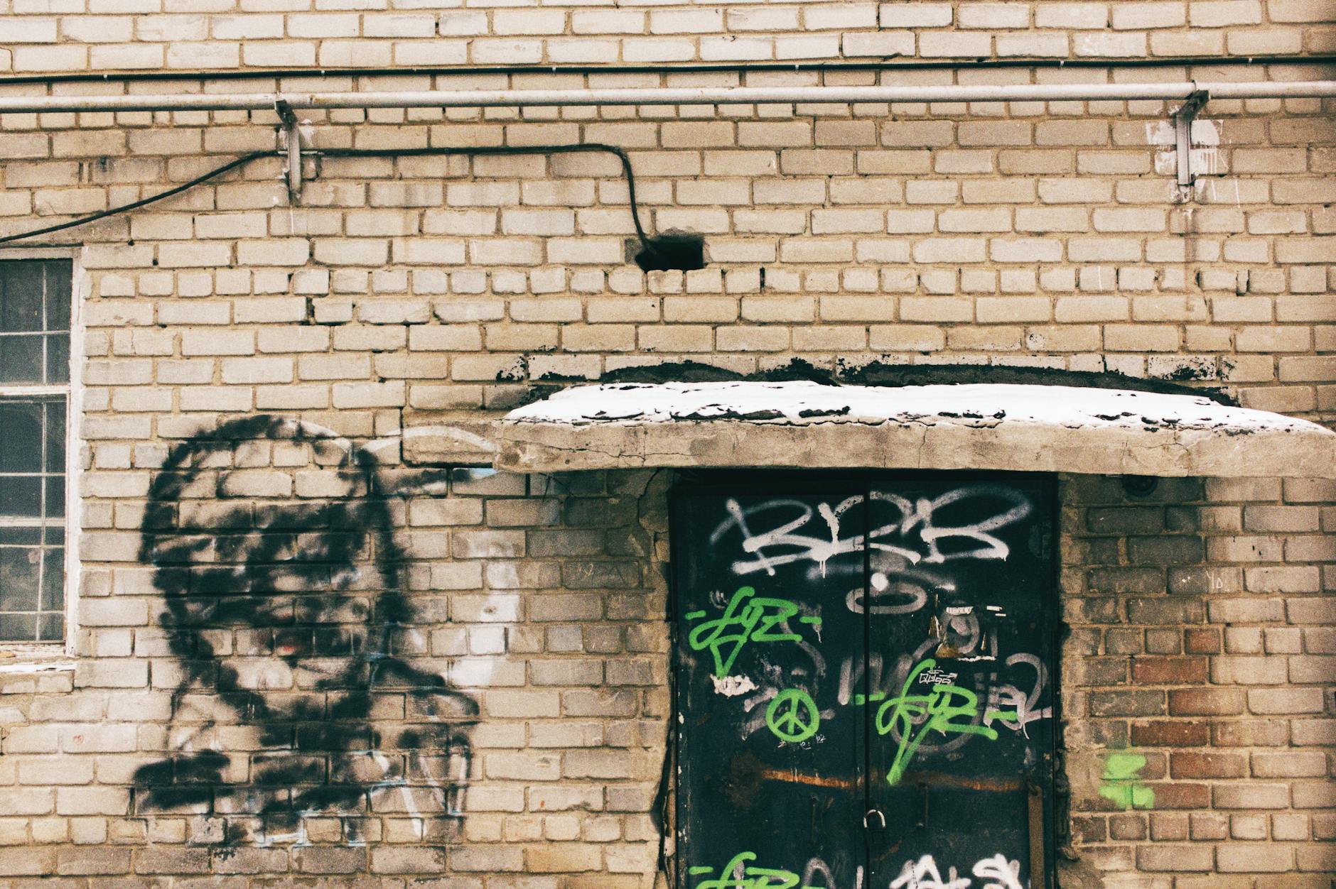 graffiti art on urban brick wall